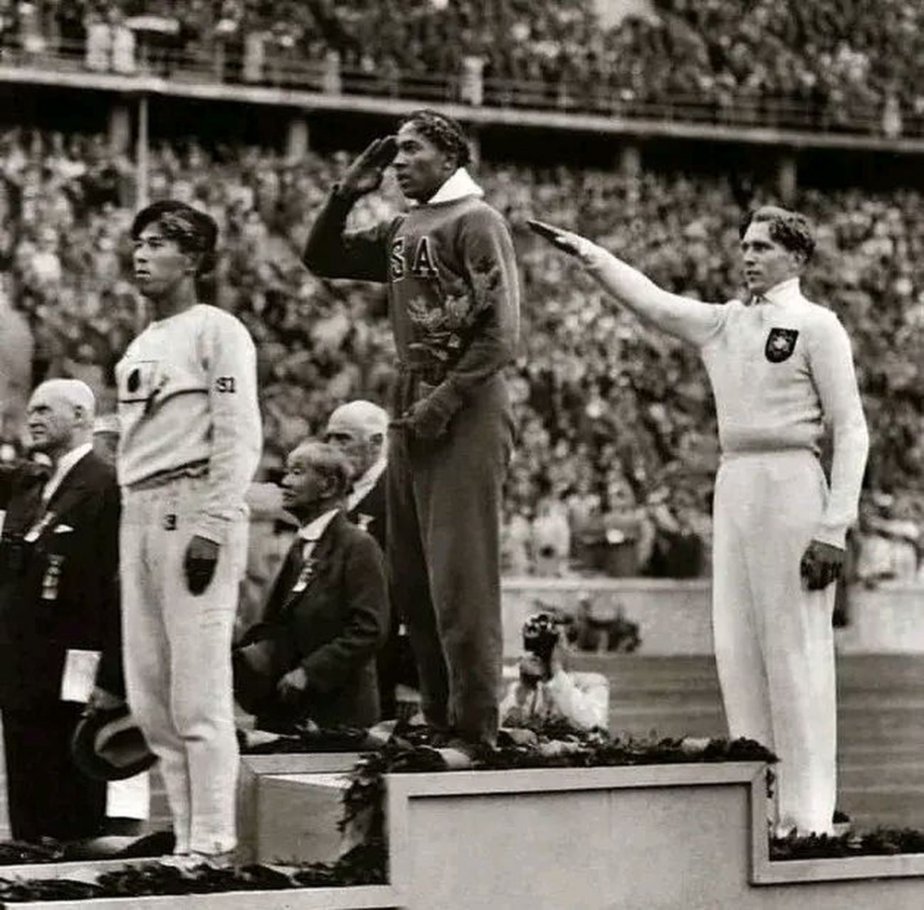 1936年,柏林奥运会,男子跳远项目第一,二,三名.