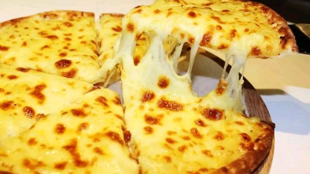 榴莲披萨无法抵挡的味道，浓浓的芝士奶酪，比外面买的还好吃