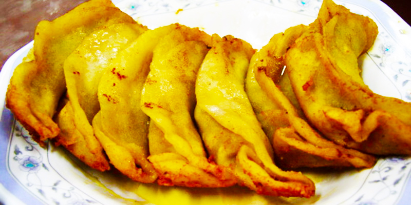 金黄酥脆,一口下去,汤汁满溢,吃不腻的七家湾牛肉锅贴