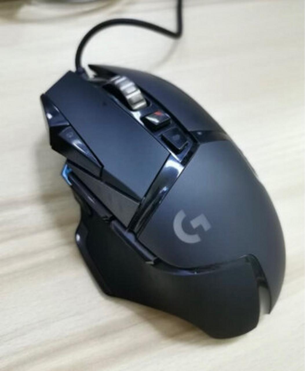 罗技g502对比罗技g303,罗技mx对比g502  罗技g502也还不错,质量上乘