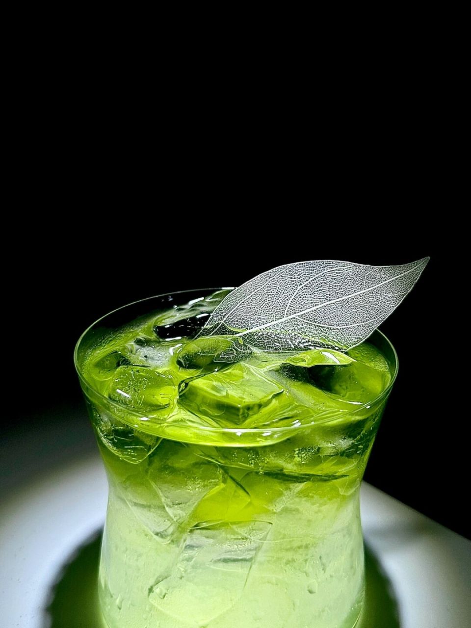 10ml     泰式绿茶:30ml  制作方法:      在摇壶中加入朗姆酒,椰子水