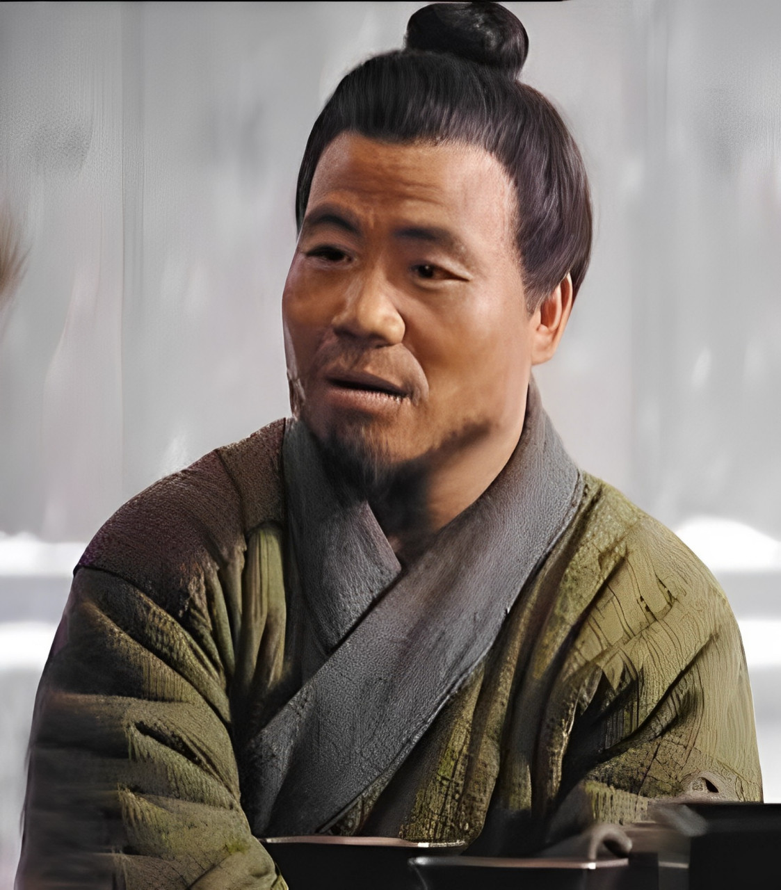 1992年,山东武大郎墓被发掘.专家打开棺材,发现了一张照片.