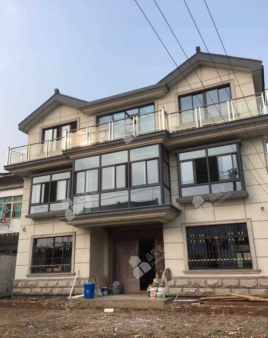 石材太贵,还是真石漆性价比高,建成效果也不错真石漆饰面别墅建成实景