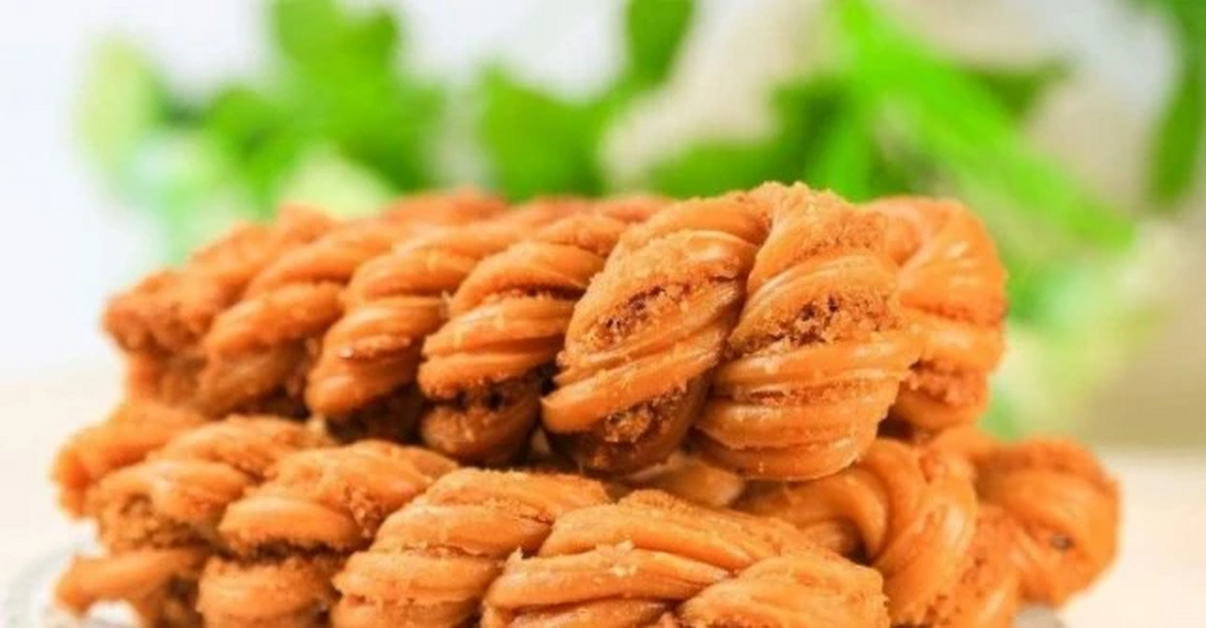 天津麻花是一道色香味俱全的传统名点.百年老字号,字号唤作"桂发祥".
