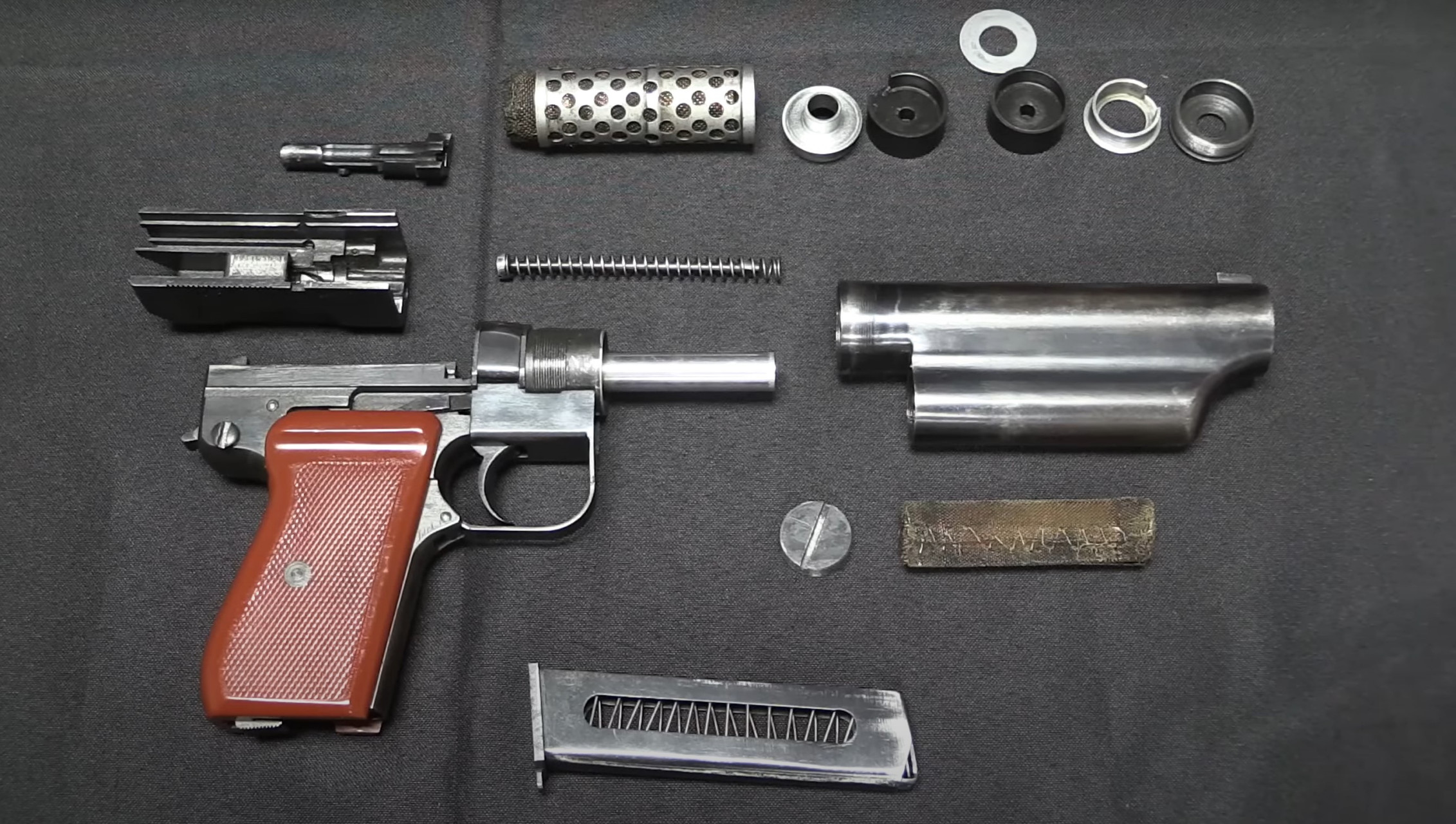 中国制造的高质感,拆解64式手枪,综合来看水平可还行?