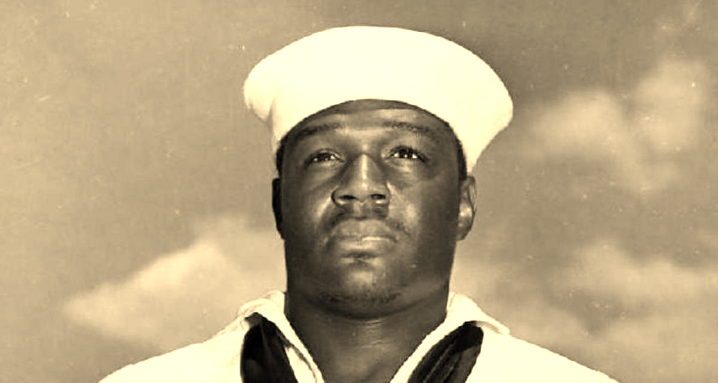 1941年,日军偷袭珍珠港,时多里斯·米勒放下厨具,拿起从没用过的高射