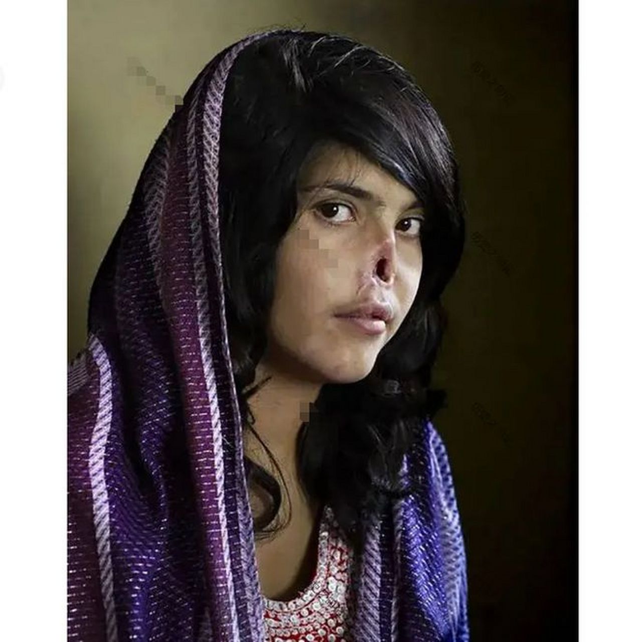 一张照片,让人们看到了阿富汗妇女的现实.