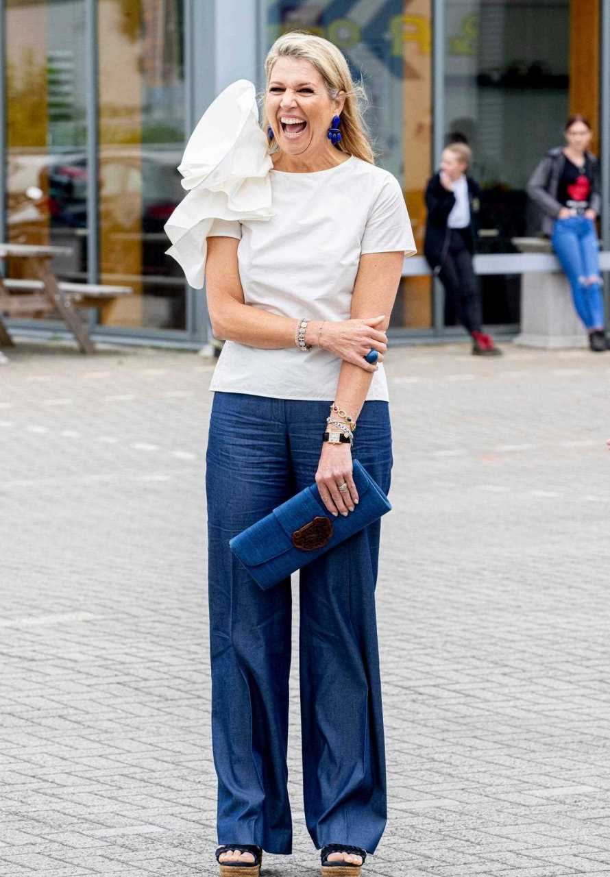 荷兰王后马克西玛的穿搭总是大气优雅,自带王者气质,微胖的身材更能