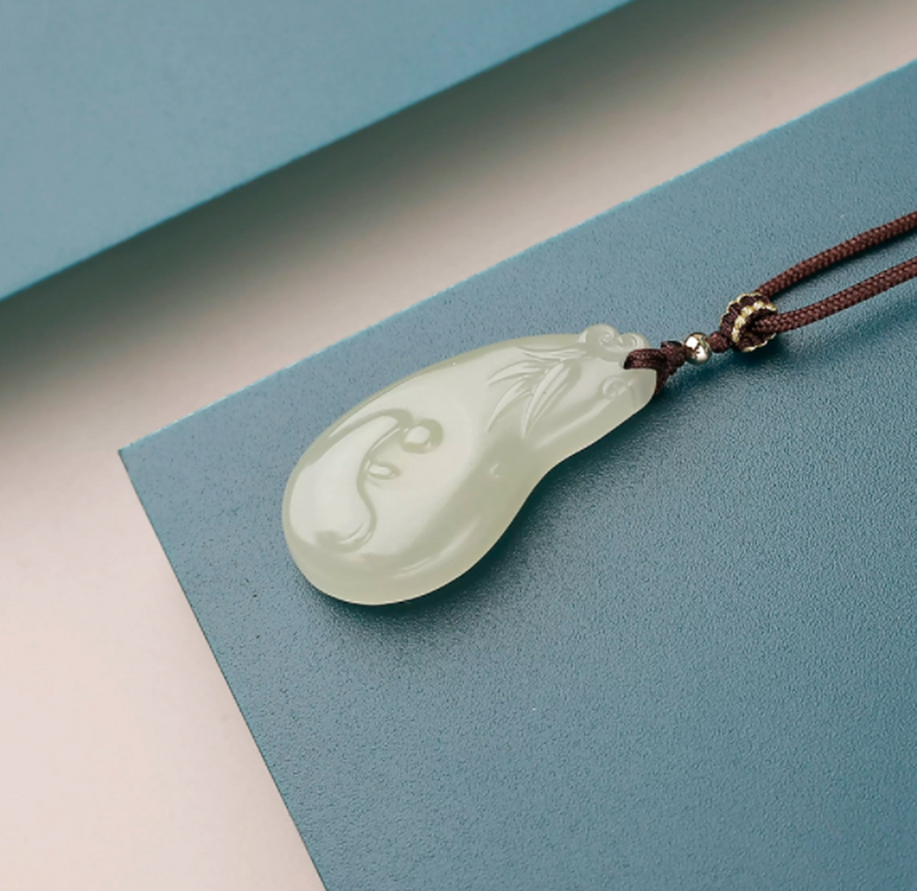 和田玉##点击头像看直播# 和田玉青玉无相佛吊坠,茄形的吊坠小巧精致