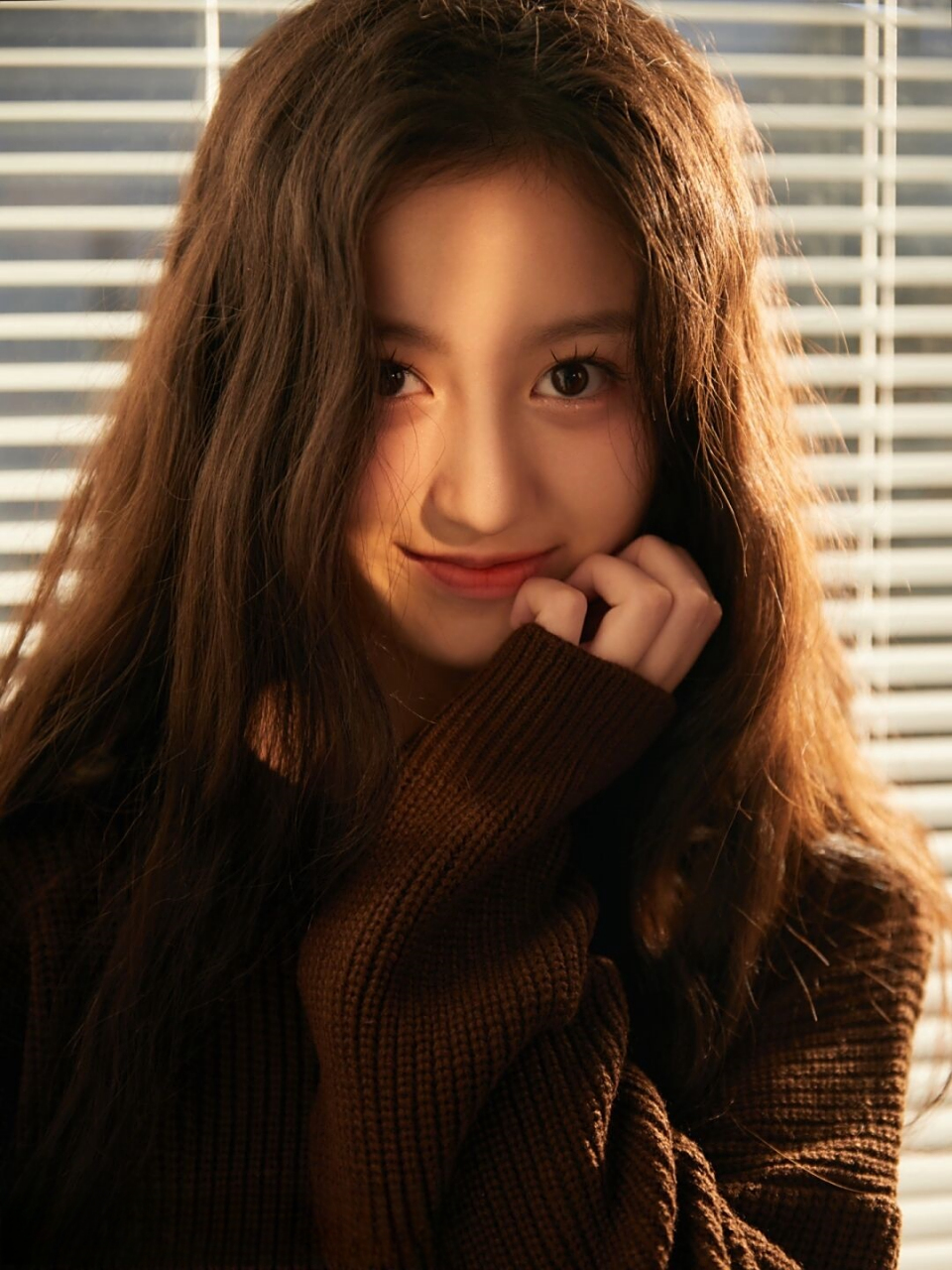 捕捉瞬间之美: 裴佳欣的氛围感写真艺术  温暖而悠