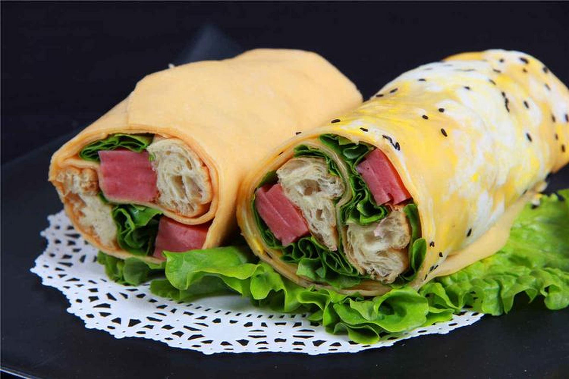 99煎饼果子的做法99 95煎饼果子是一种流行于中国北方地区的