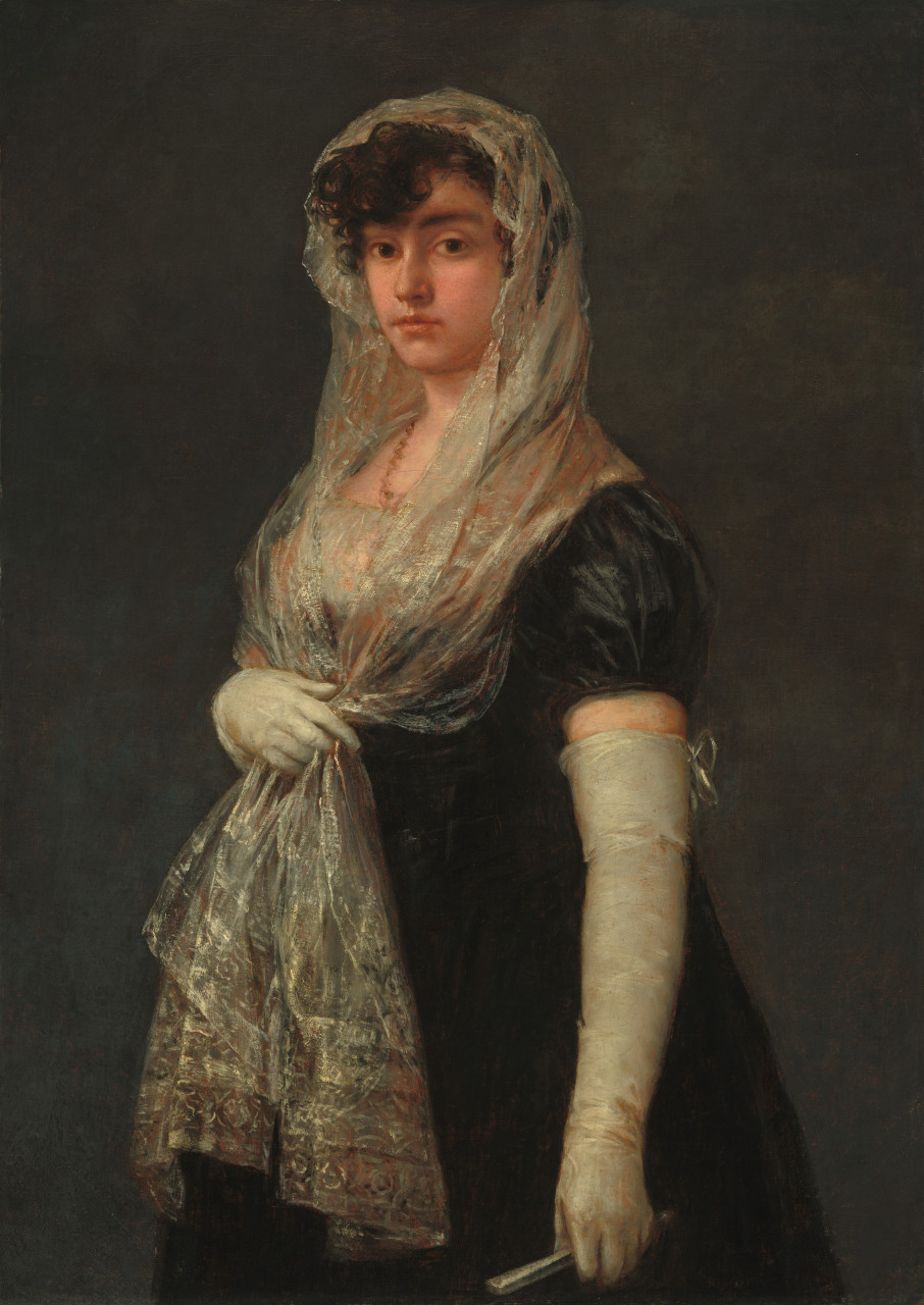 wearing a mantilla and basquina 中文名称:	戴着头纱的年轻女士 画