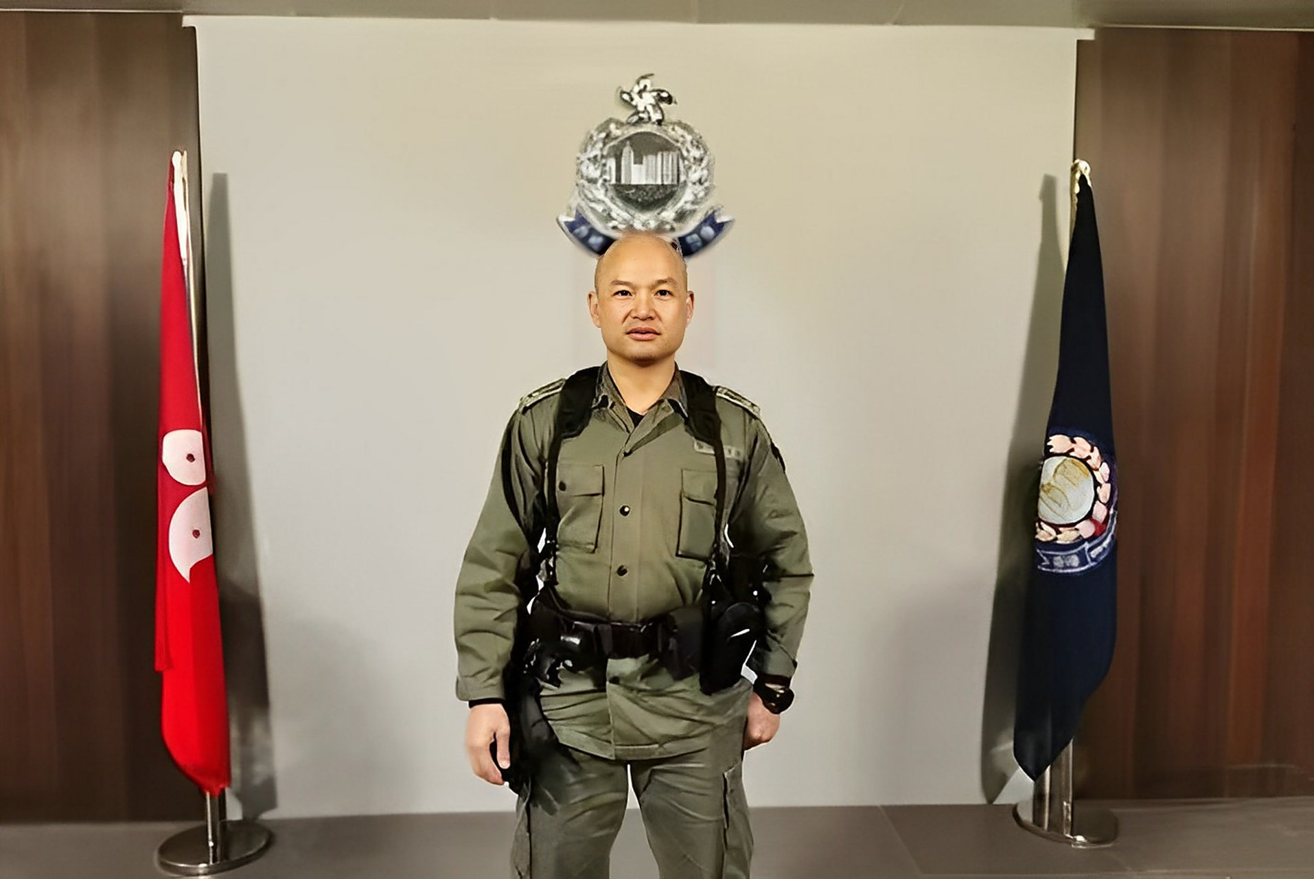 刘泽基,香港警务处,机动部队警署警长,人们 他亲切地称他为"光头刘sir