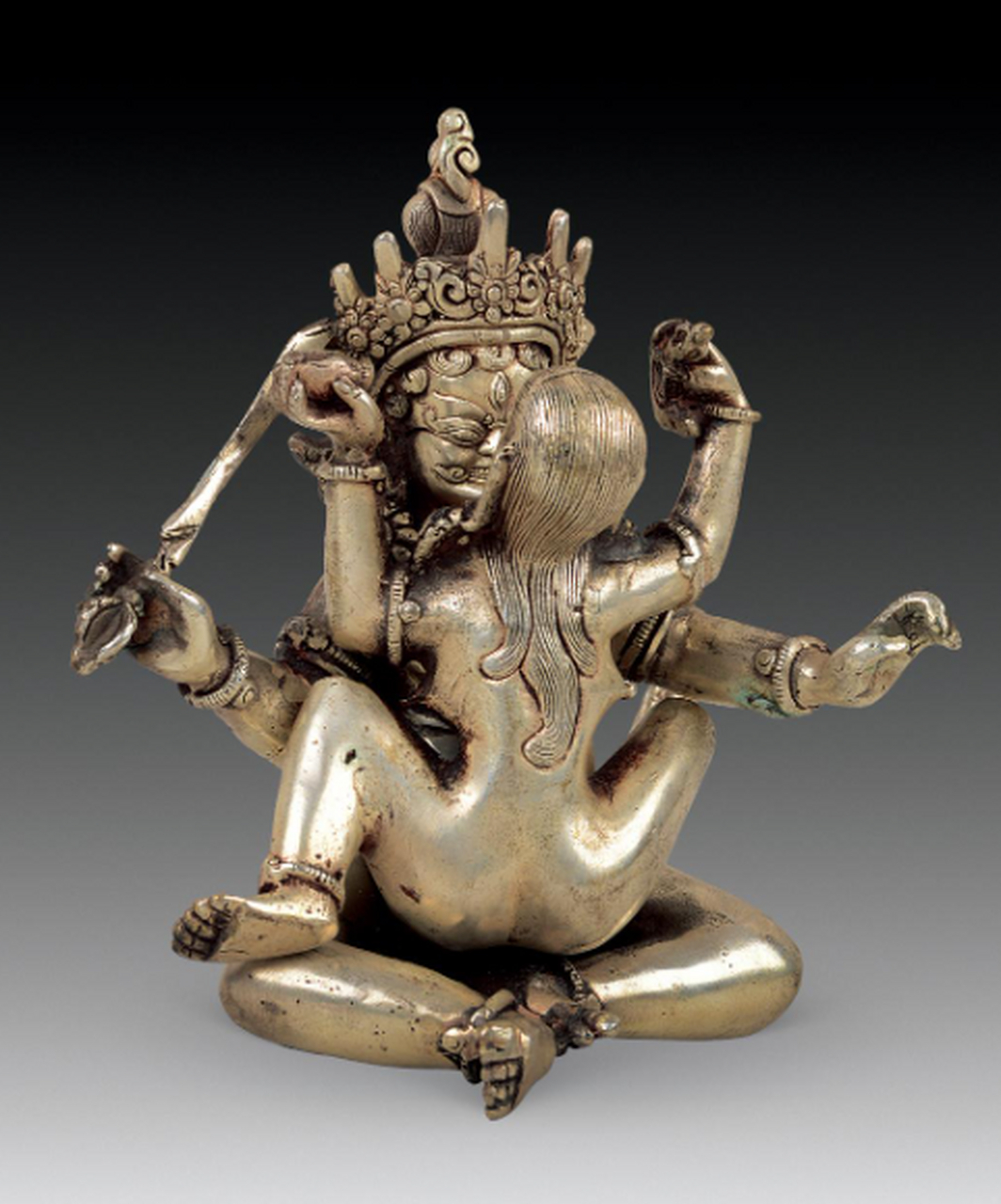 欢喜佛是印度密教与西藏当地信仰结合的藏传密宗的本尊神,一般以男体