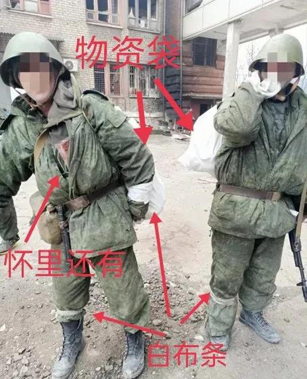 领到物资的乌东民兵和抽烟的战地女记者.