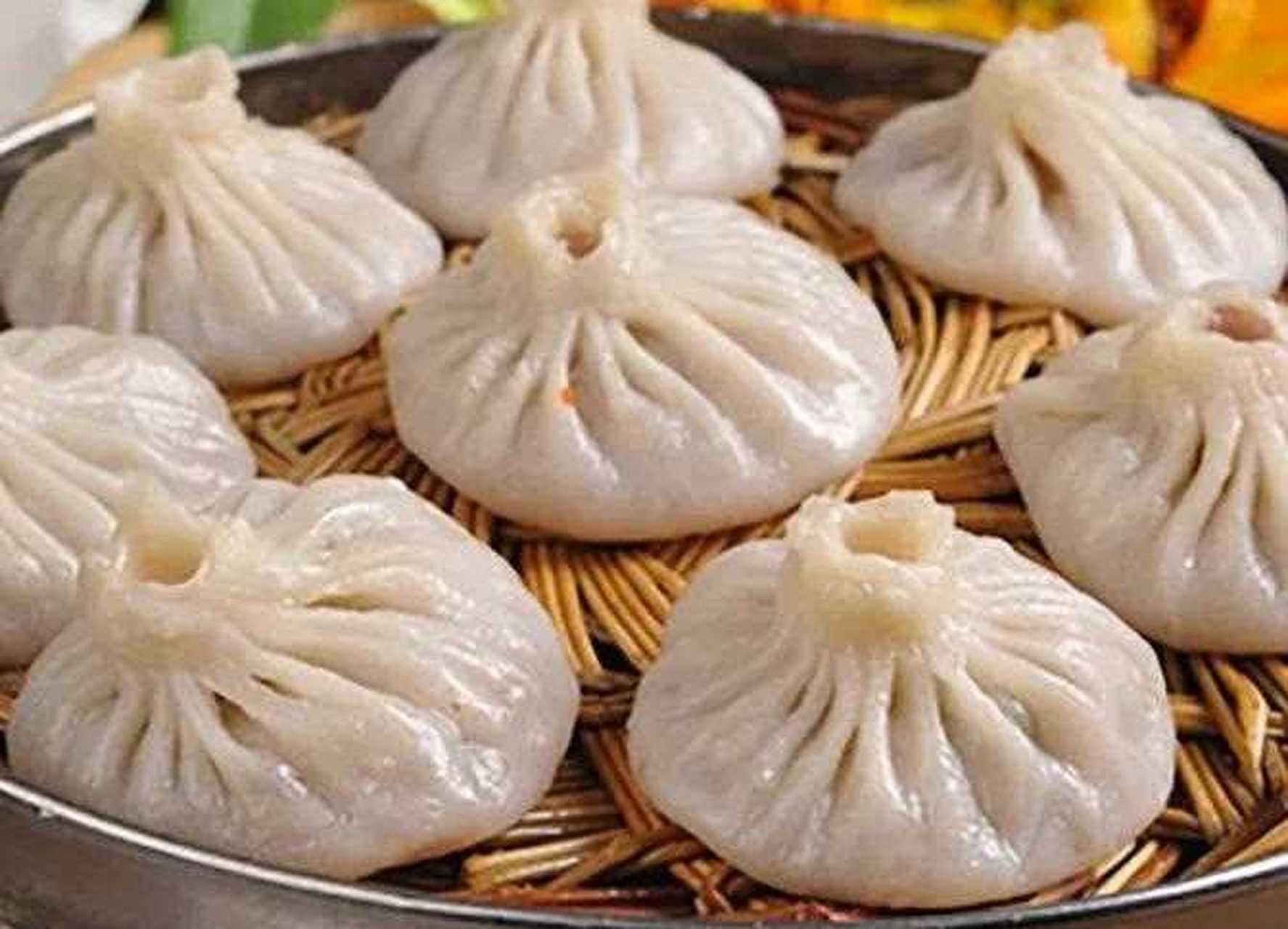 天津大骨灌汤包 [打call] 肉馅 400 克,腐乳加乳汤 10 克,味极鲜 10