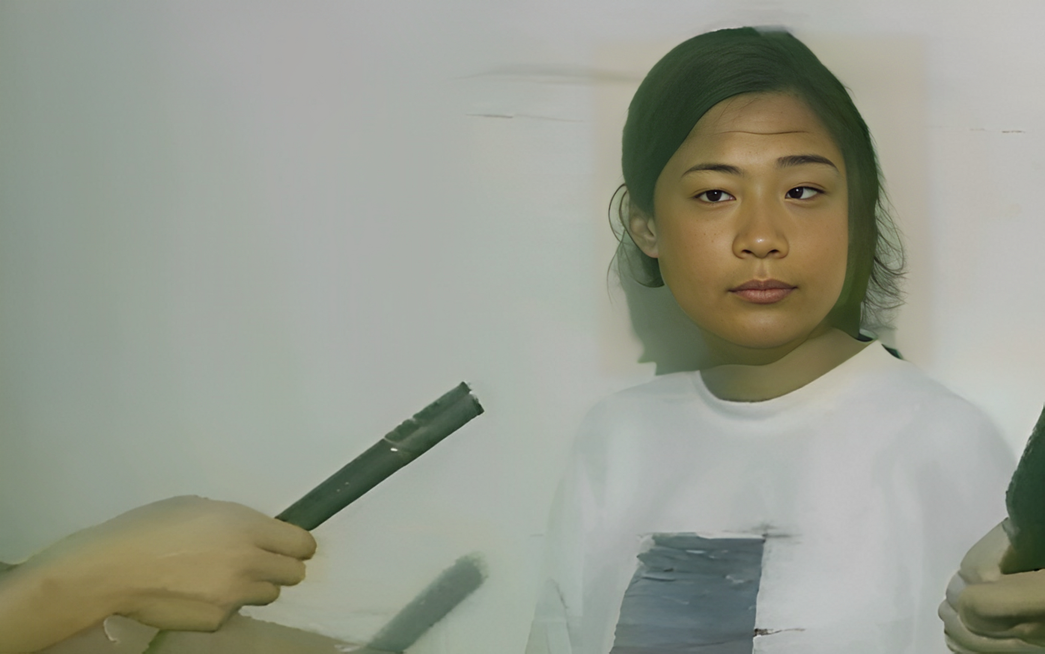 1995年邵苗苗在被捕后接受了采访!照片里她的肤色有些暗!