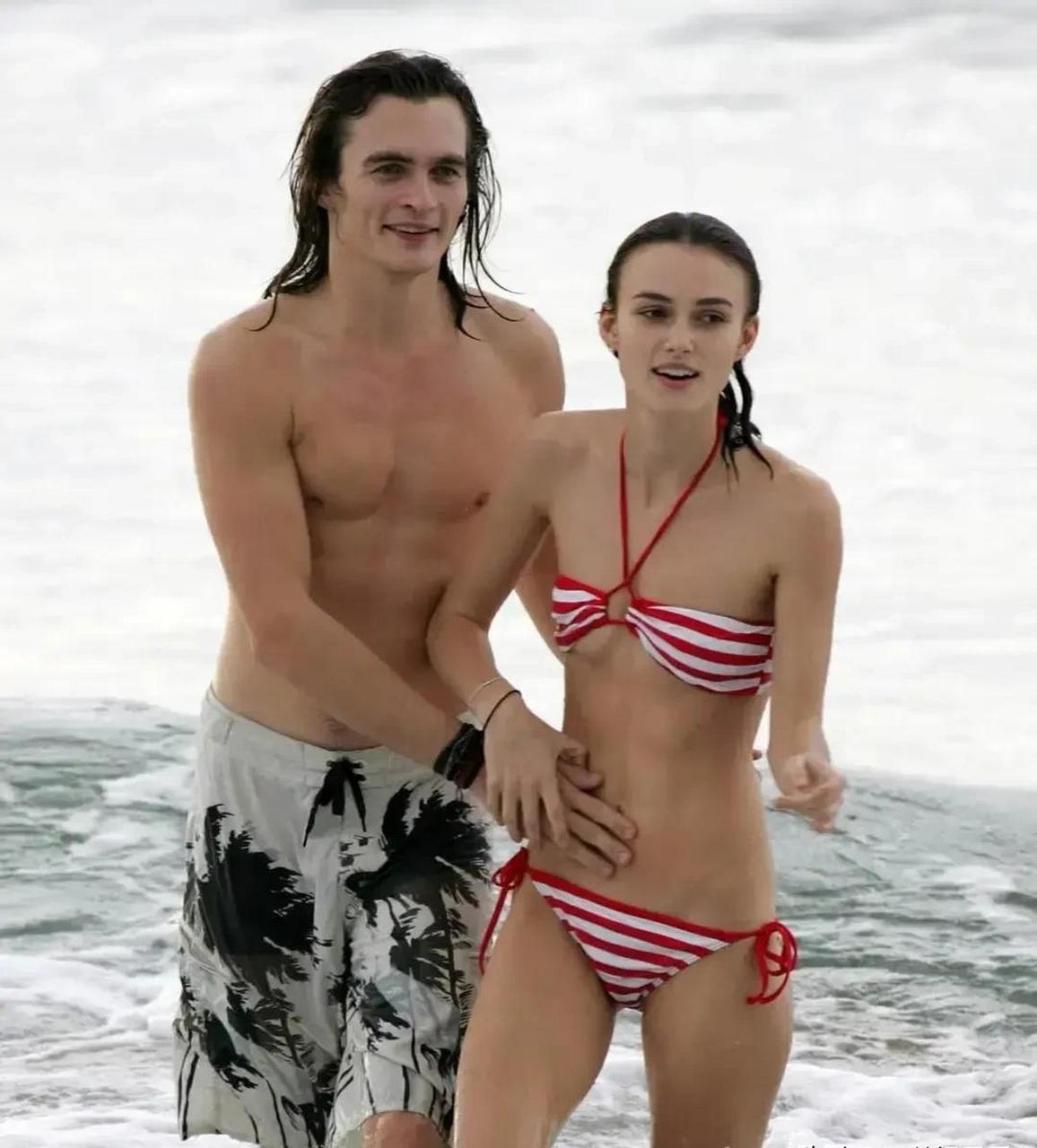 奈特莉和男朋友一起在海边游玩,两人身材遥相呼应…… #头号周刊