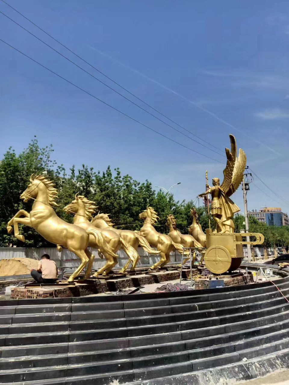 阿波罗战车不锈钢群雕雕塑是以希腊神话中的太阳神阿波罗驾驶战车为
