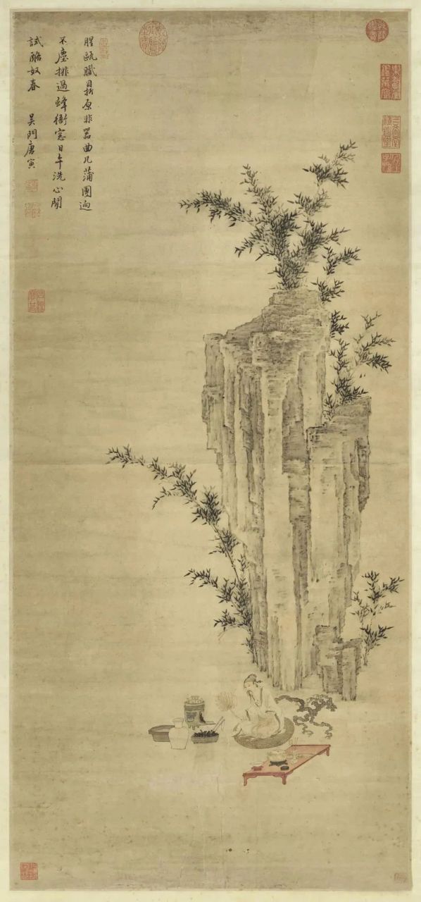 唐寅《煎茶图》,画庭院巨石翠竹下,一高士坐蒲团上执扇煽炉煎茶.