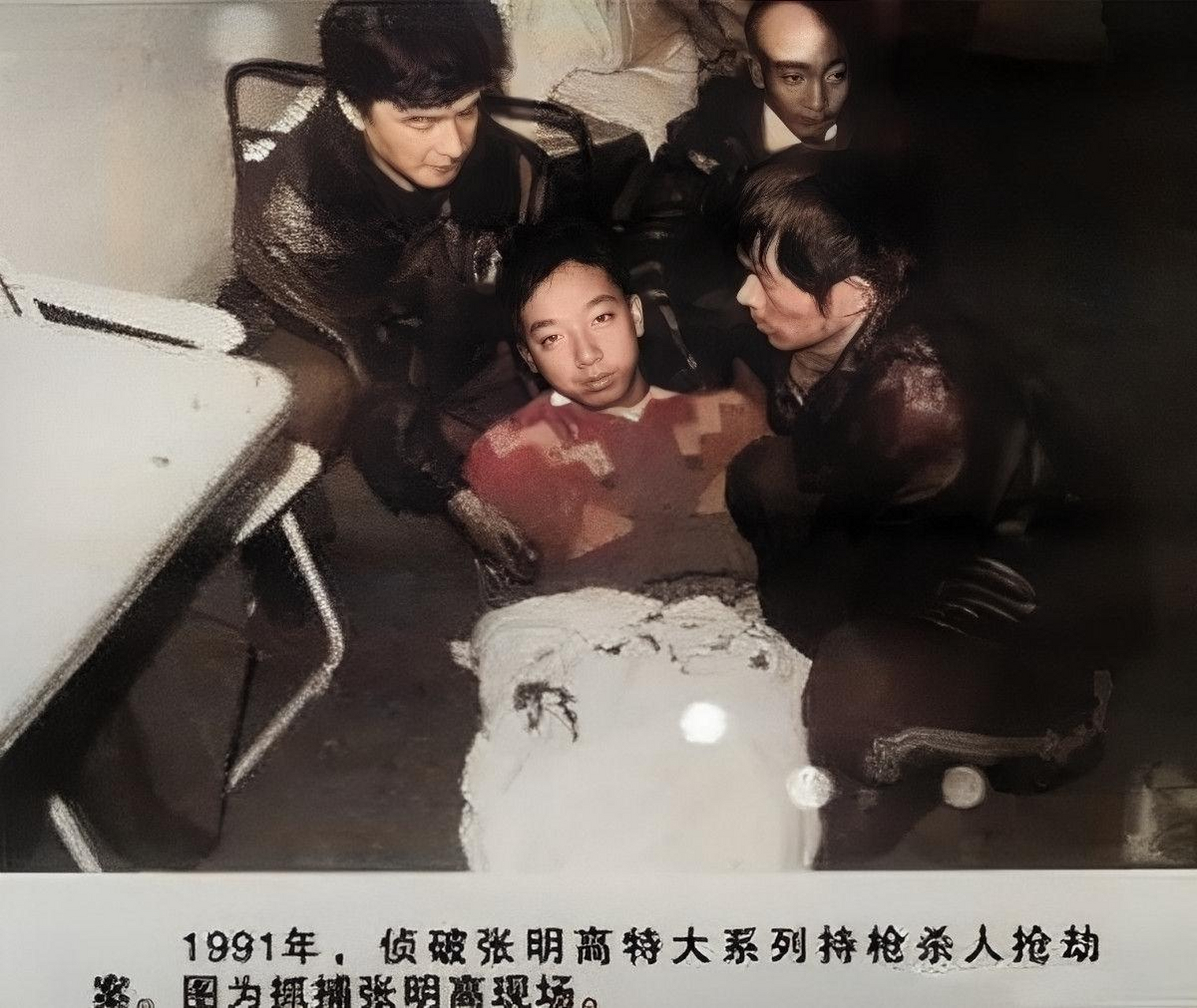 张明高是一个背负着21条生命的混混.