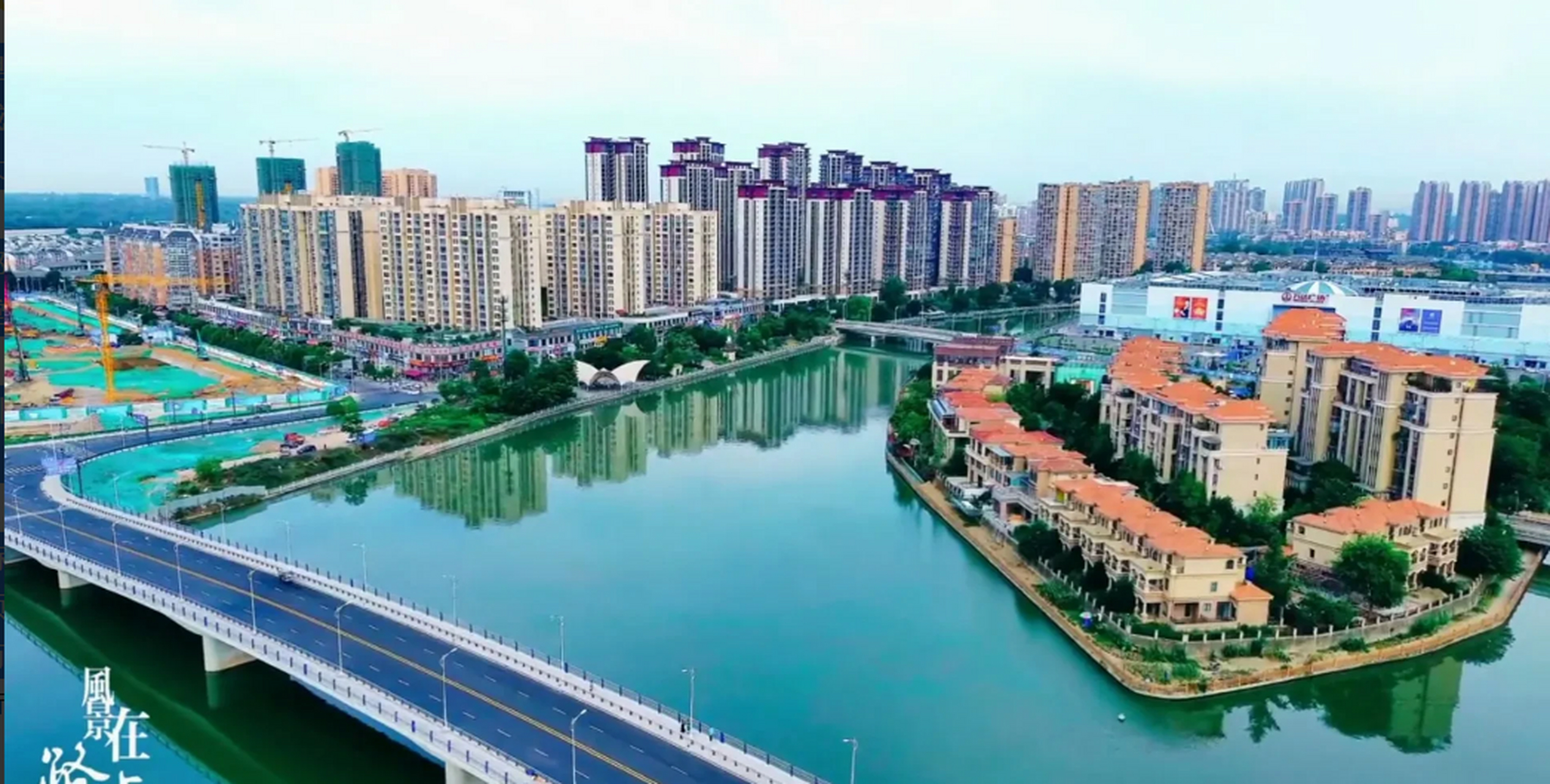 这里是沱江第一城--金堂县,水蓝碧绿,大桥的视感很强.