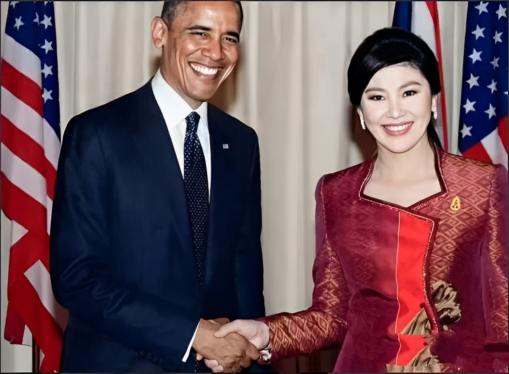 也许只有英拉的美貌吸引了奥巴马的注意.毕竟,美女·总理是罕