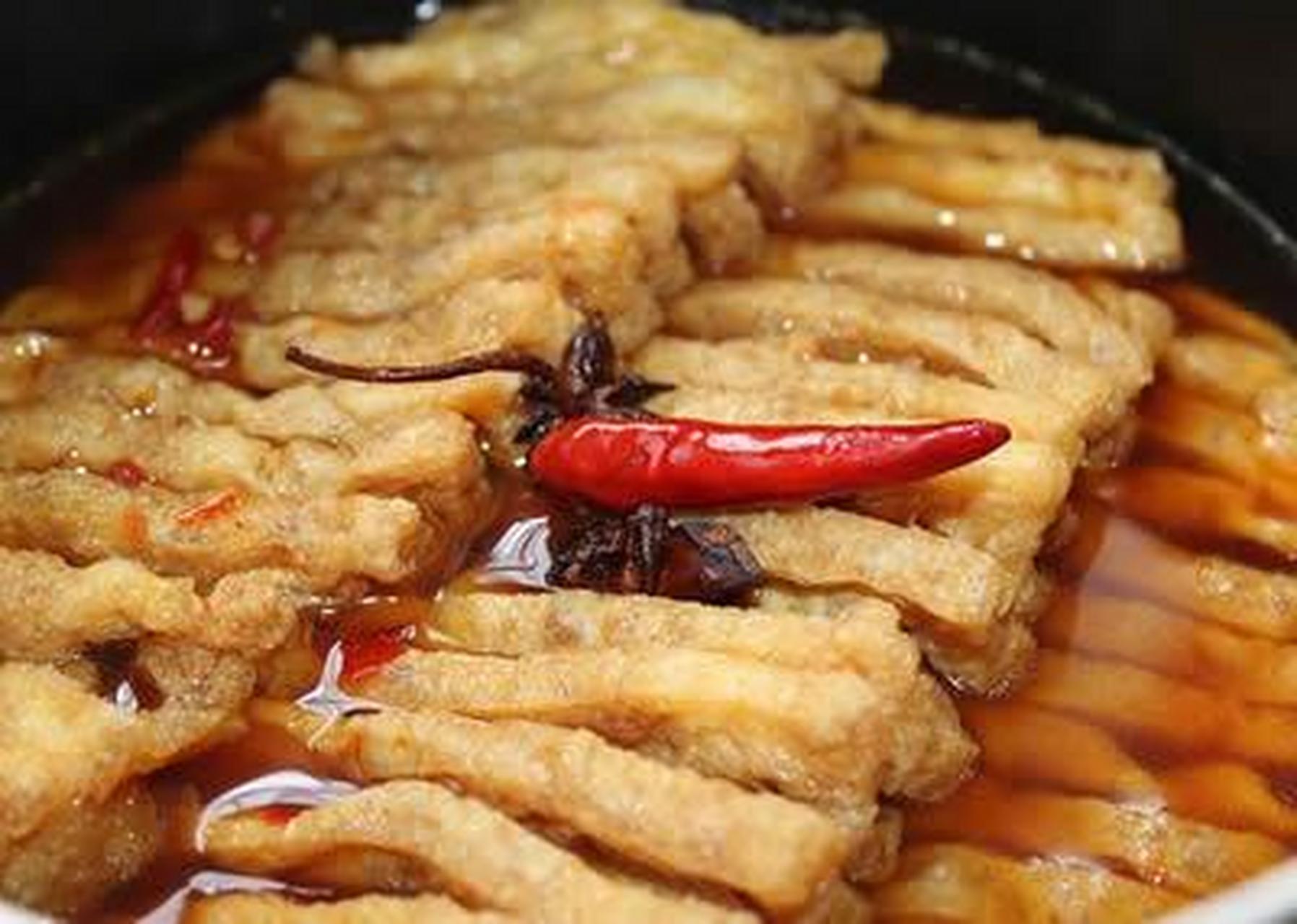 满汉全席里也有它朴素的身影,因切好的豆腐干形似兰花得名