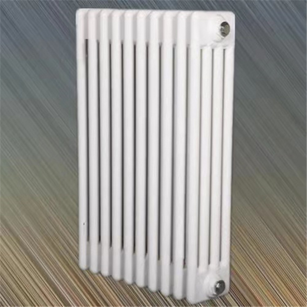 钢管圆四柱暖气片 钢四柱散热器使用的片头是由特殊耐腐蚀材料制成的