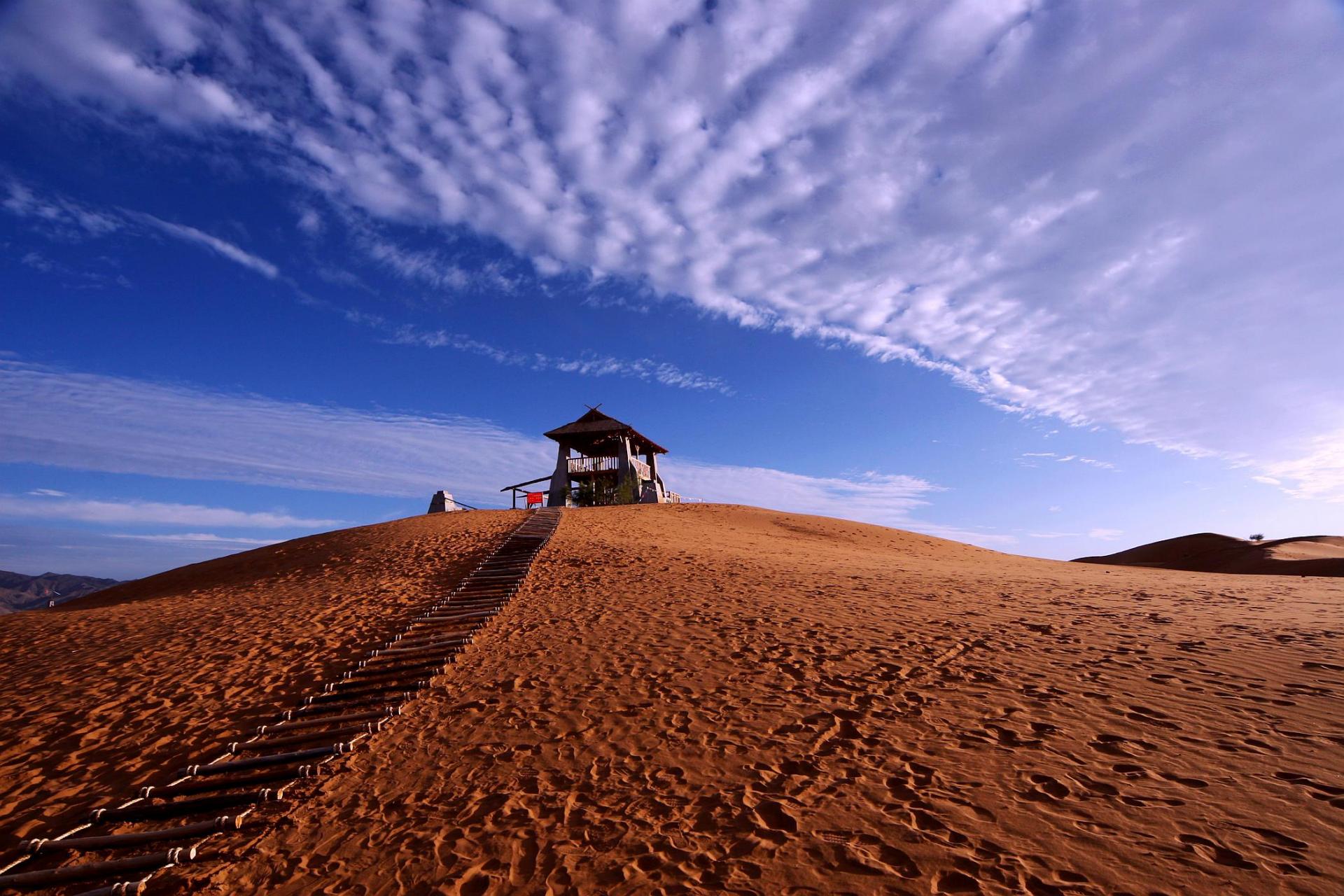 旅拍地推荐——沙坡头旅游区 沙坡头旅游区是中国十大最好玩的地方之