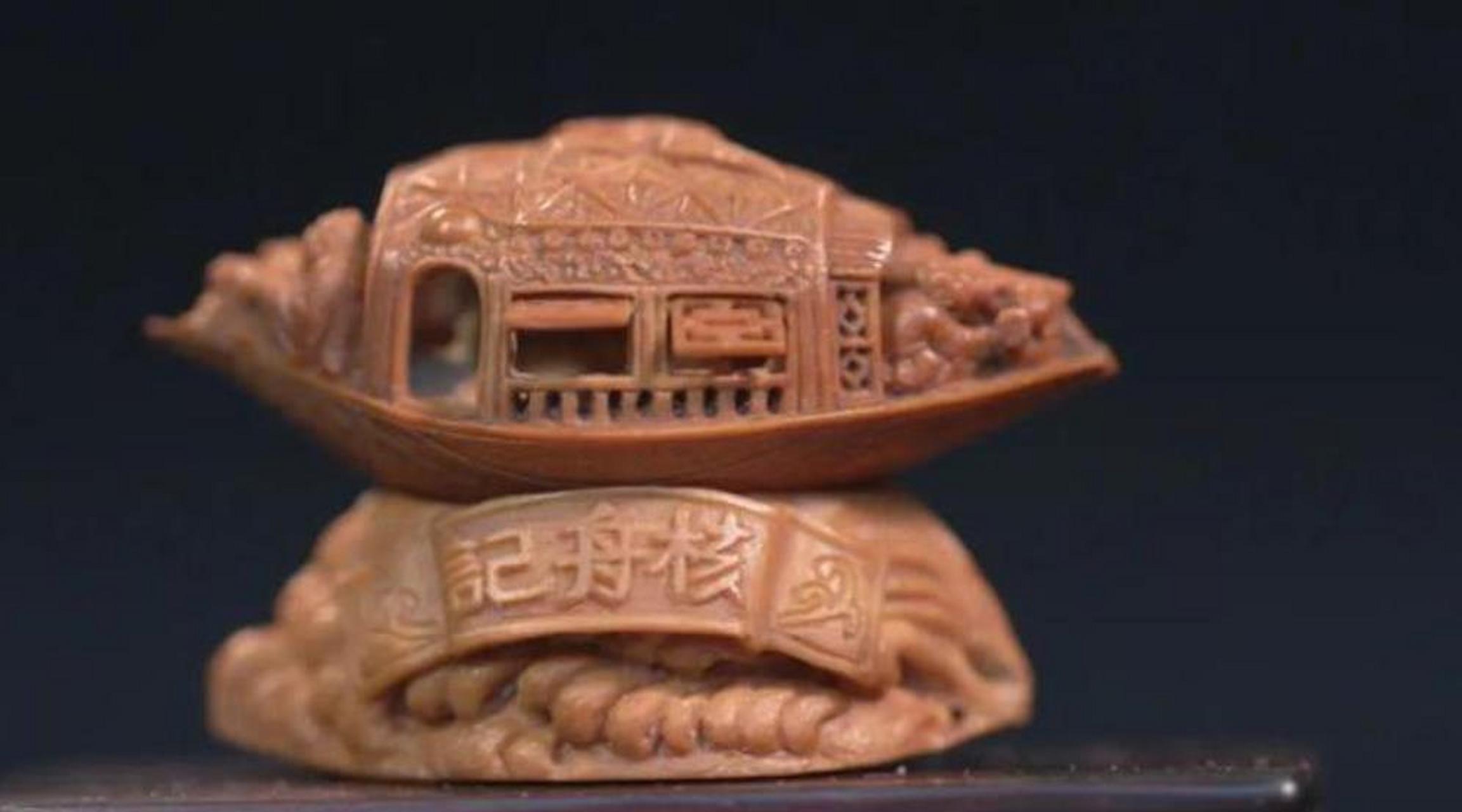 明代作家魏学洢记录了一个雕刻工艺品,以径寸之木雕刻了苏轼与黄庭坚