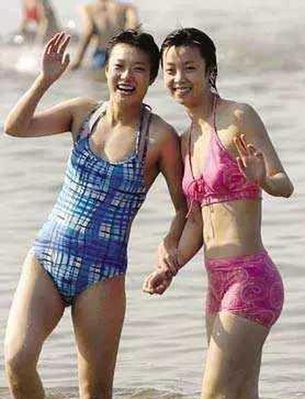 在世界乒坛有"大魔王"之称的张怡宁,早年间的泳装照!