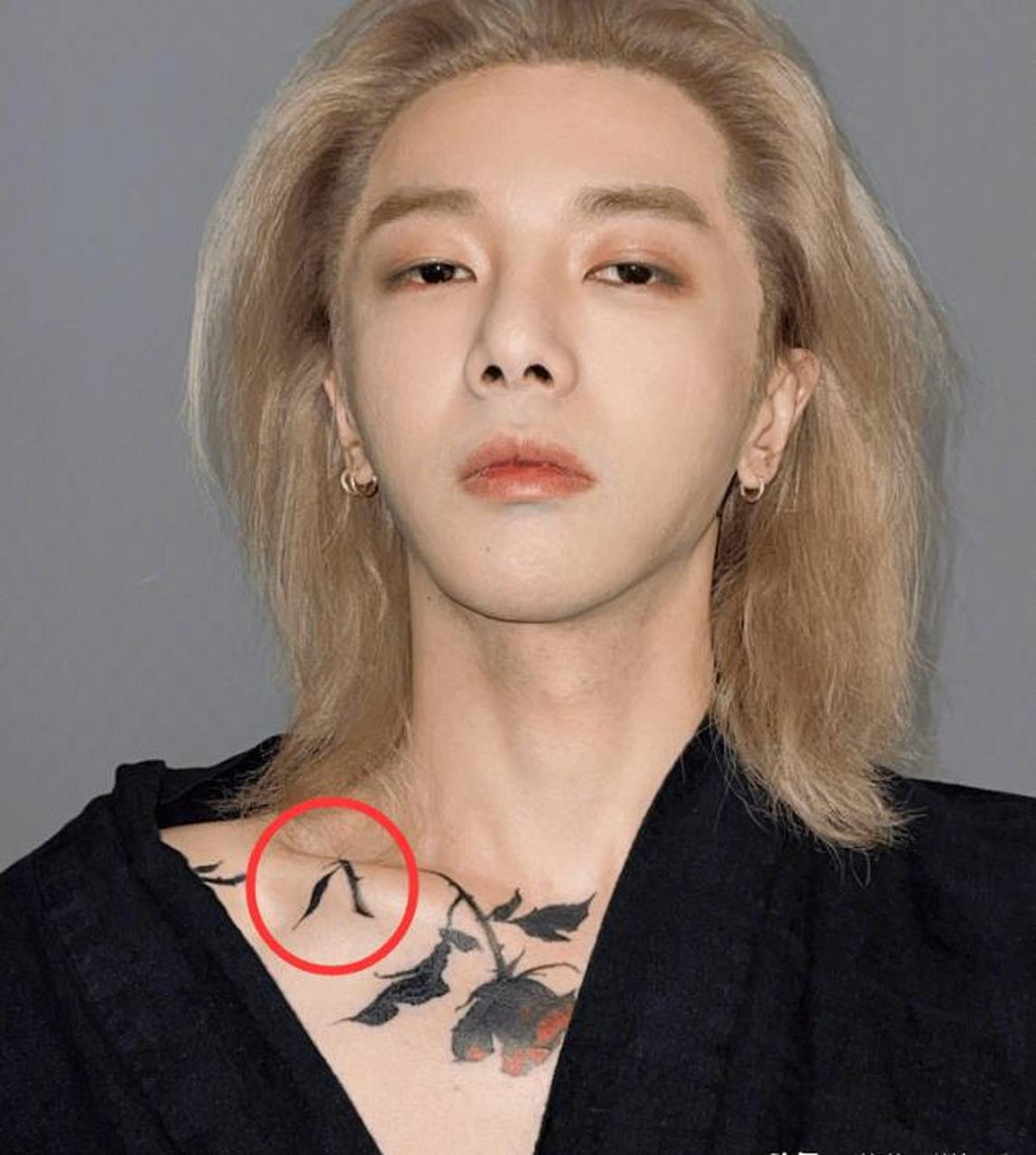 华晨宇身上的纹身,一朵玫瑰,象征着爱情,旁边还有一个"八字".