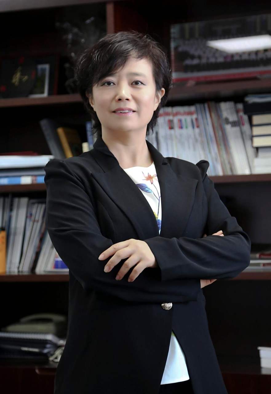 比亚迪总裁王传福的妻子李柯,她质朴干练,善良漂亮,且深爱王传福!