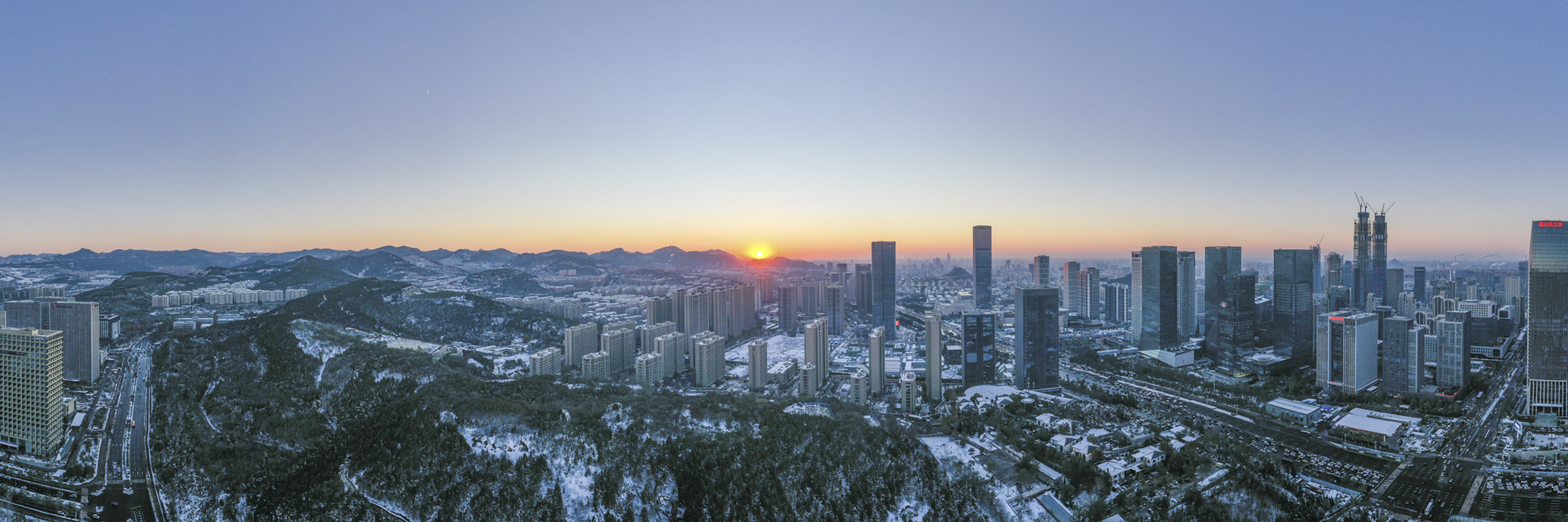 航拍济南cbd全景图 一场冬雪后的傍晚,无人机航拍济南cbd全景图.