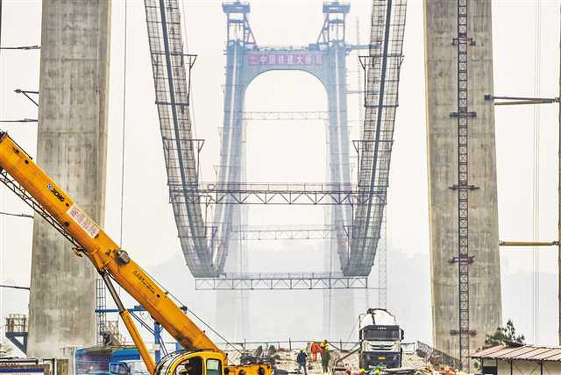 江津油溪长江大桥进行悬索施工,合璧津高速公路油溪长江大桥施工现场