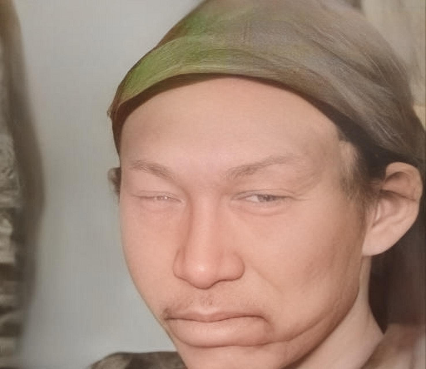 在这张1862年士兵在太平天国的照片中,坐在中间椅子上的男人是将领