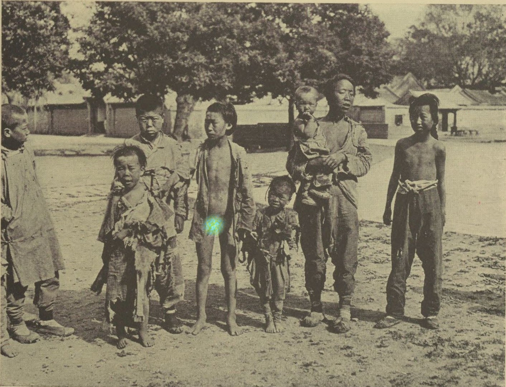 这是一张让人揪心的老照片,拍于1921年北京街头.