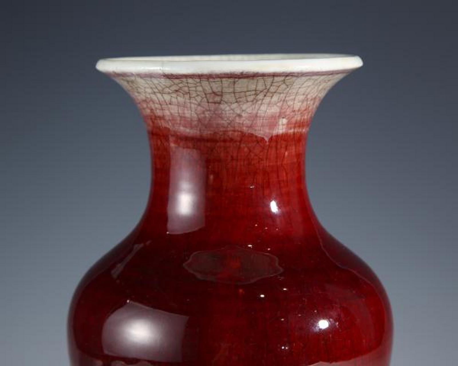 瓷器鉴赏# 此件清中·郎窑红釉观音尊,口径13.5cm,高31cm,腹径17.