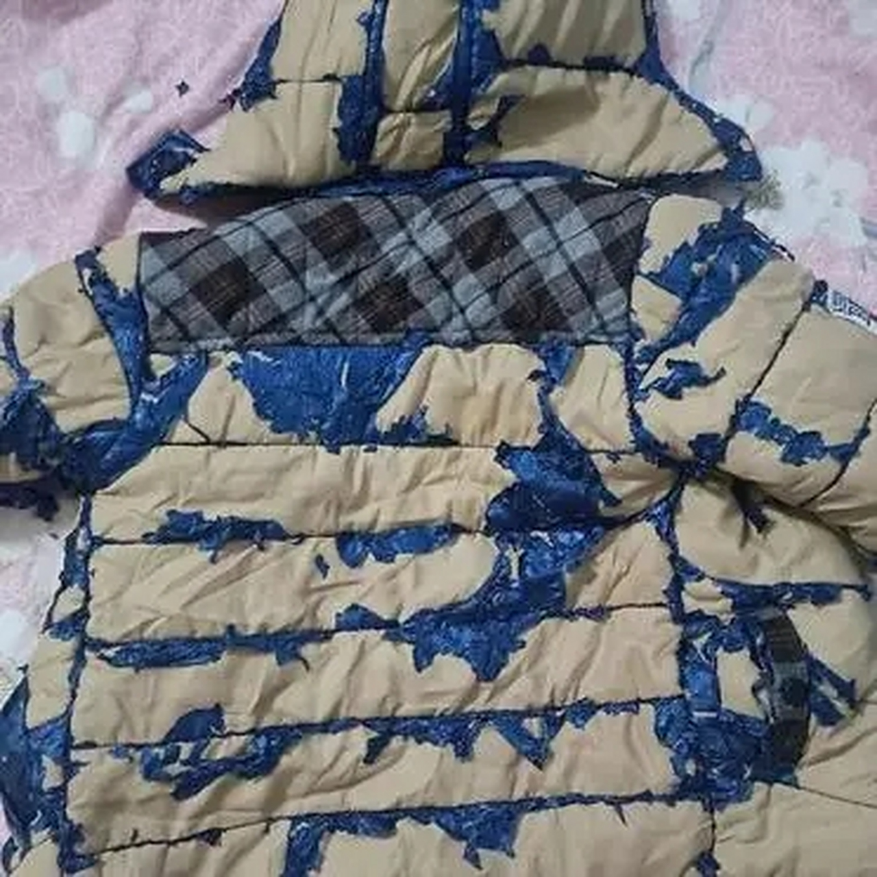 洗孩子的羽绒服洗成这样子,掉了一层皮,怎么办