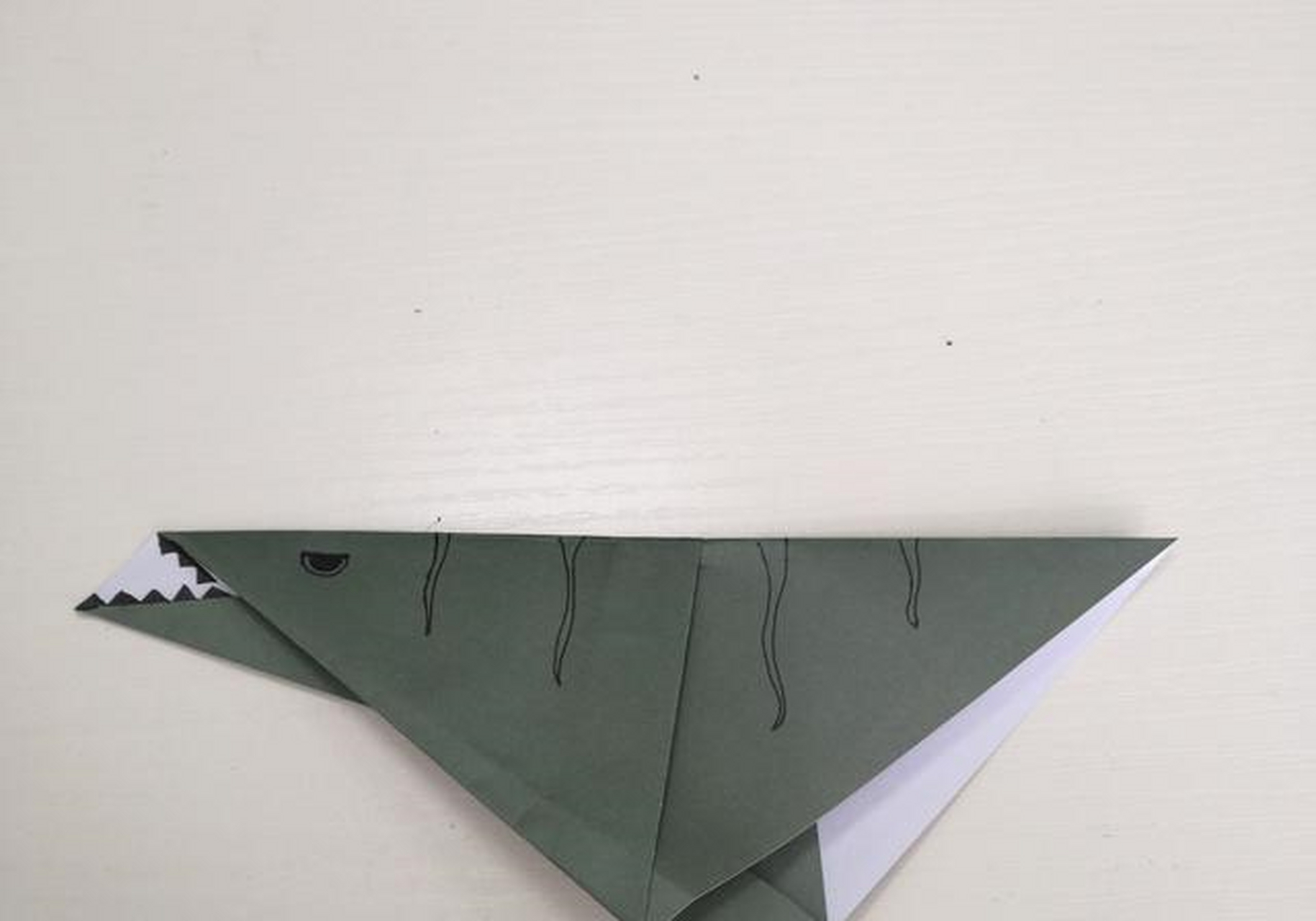 简易恐爪龙折纸图解教程,不可错过的一款恐龙折纸[绿丝带]