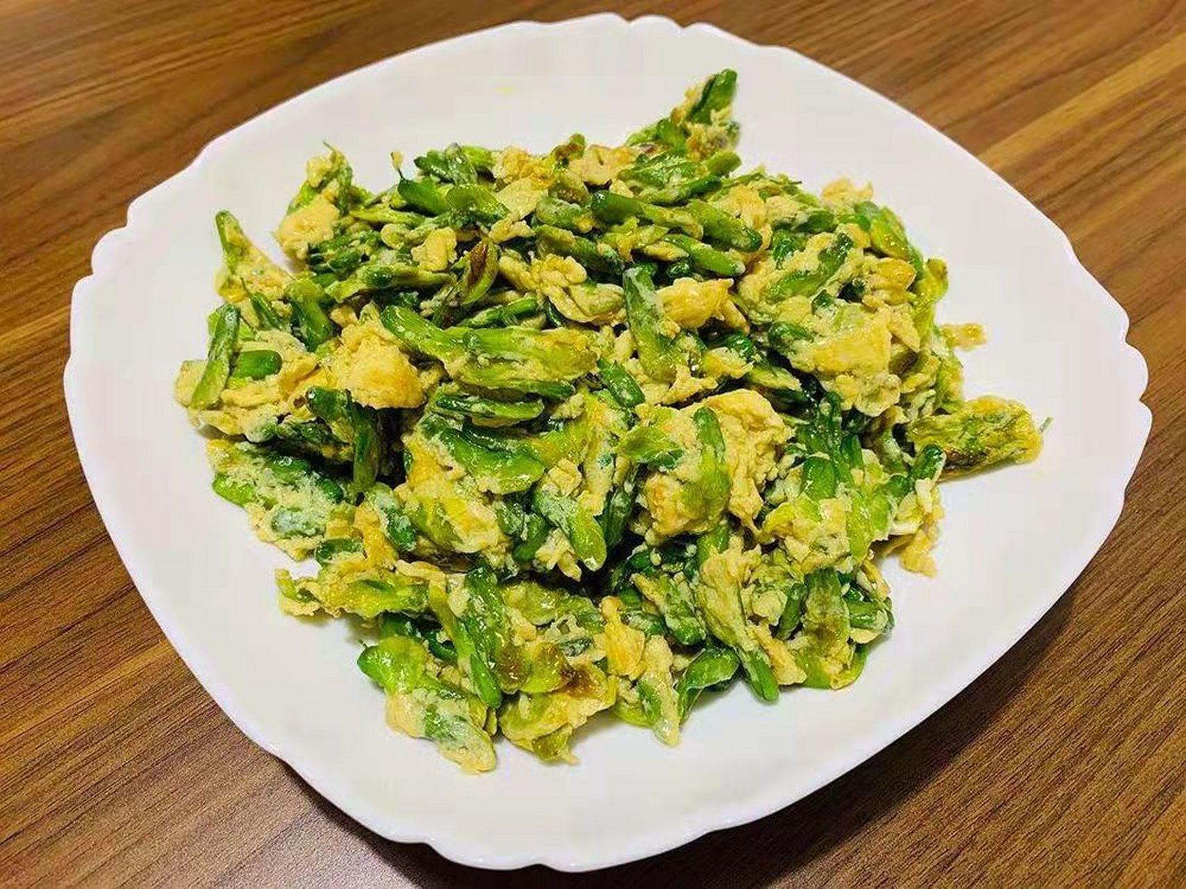 锦鸡儿的植物,它开的花非常漂亮,就像是一只蝴蝶,这种花采摘来,煎鸡蛋