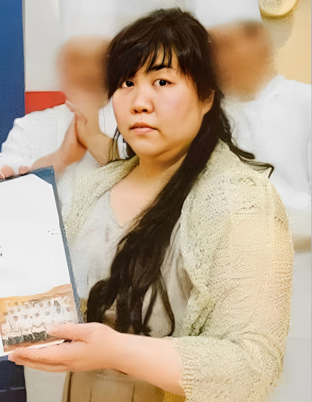 令人难以置信的是,照片中这位相貌平平,圆脸的日本女子,竟然同时与30