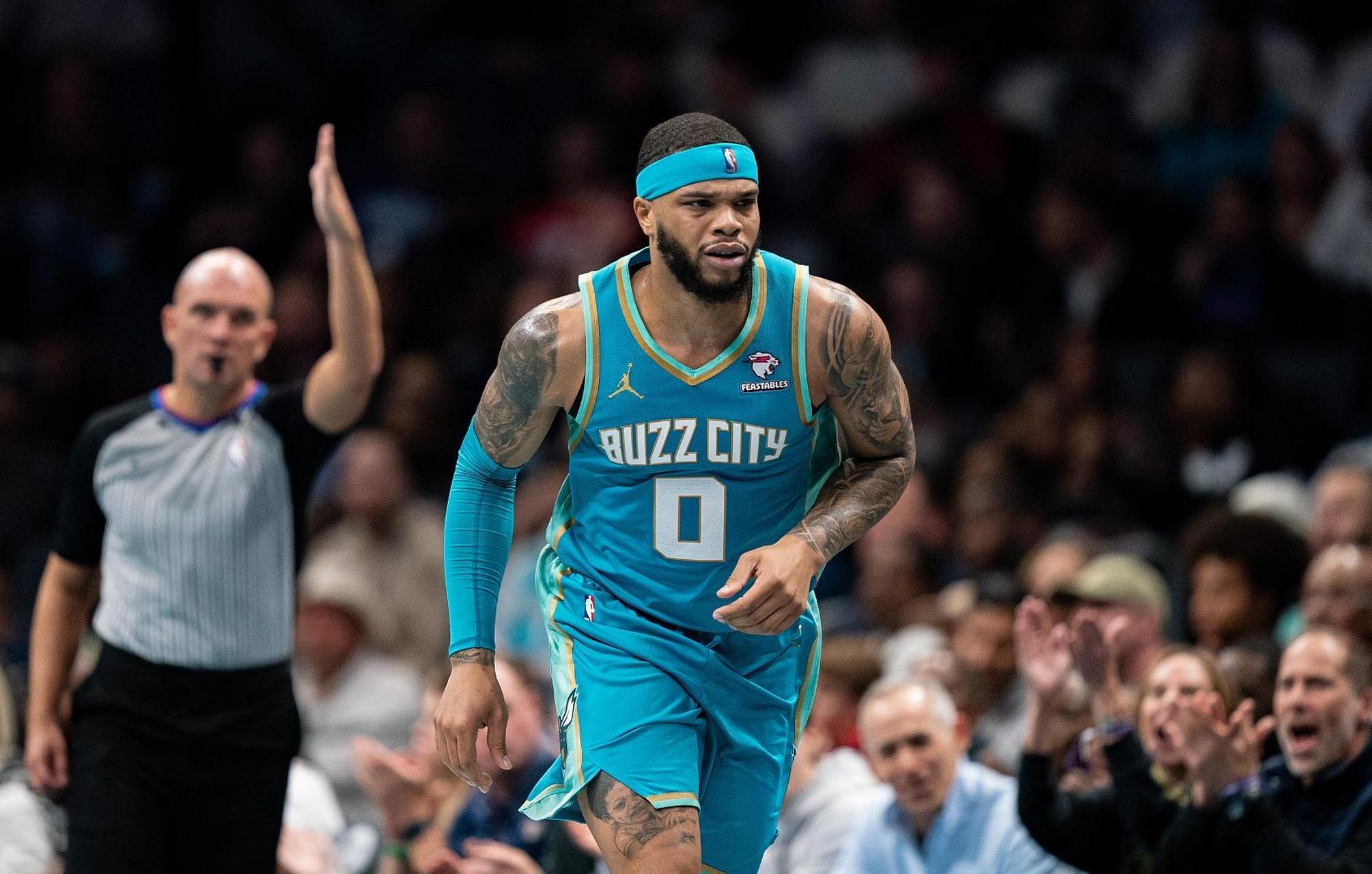 助黄蜂击败奇才  在今日nba常规赛中,黄蜂队主场以117-114险胜奇才队