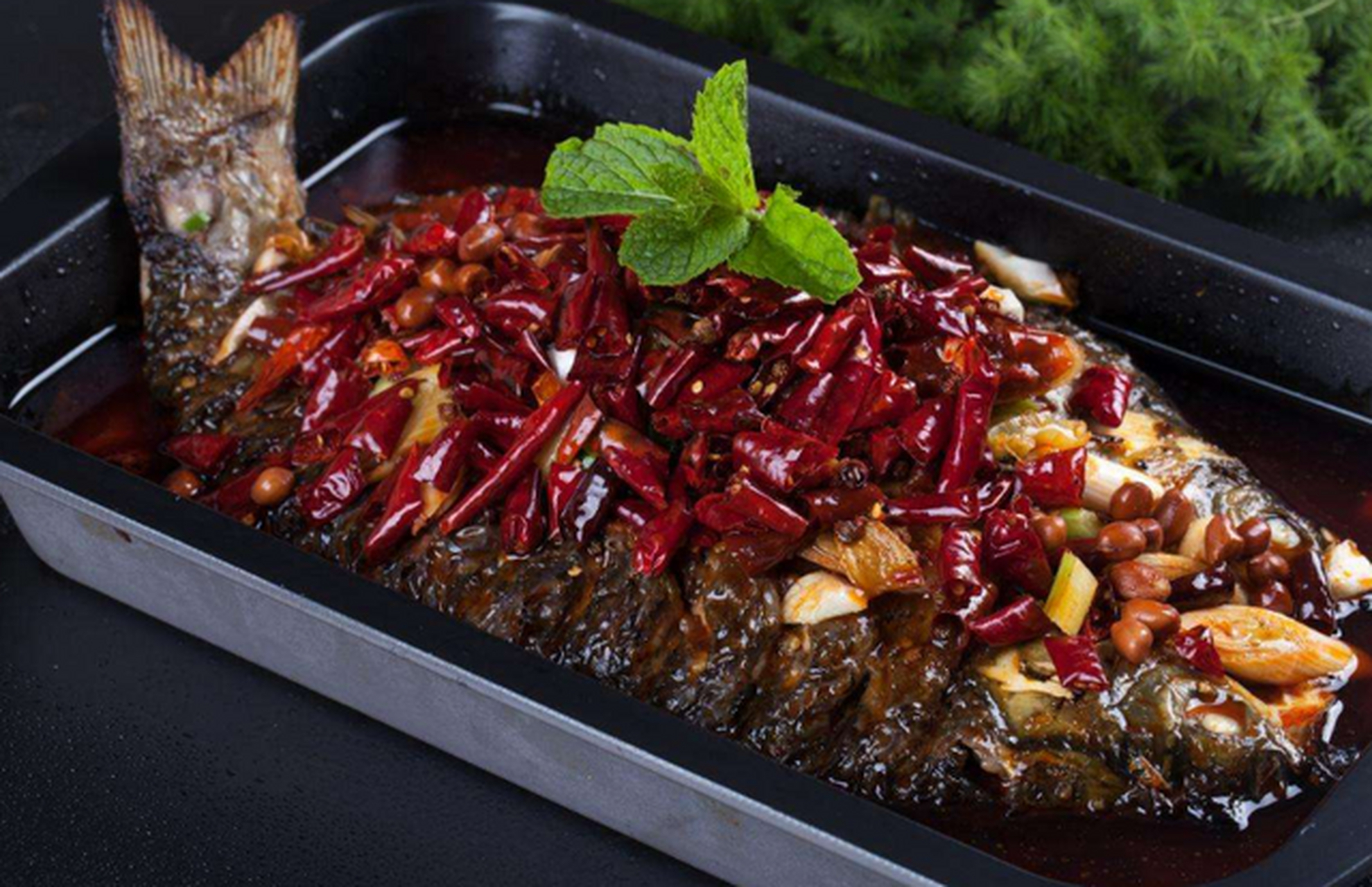 鄂州诸葛烤鱼,是湖北省鄂州市特色美食,采用祖传秘方配方,调料技术