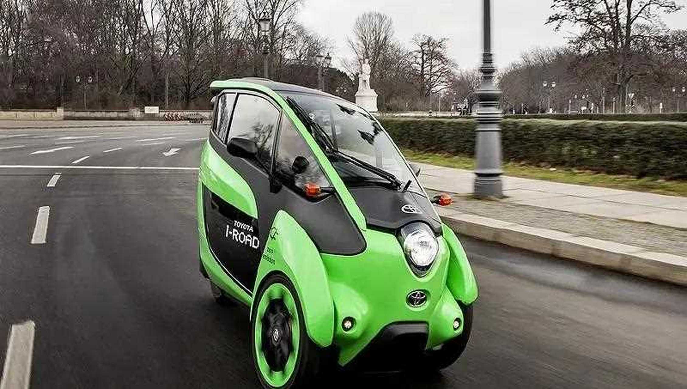 丰田电动不倒翁三轮车,前两轮为驱动轮,各输出2.7匹马力.