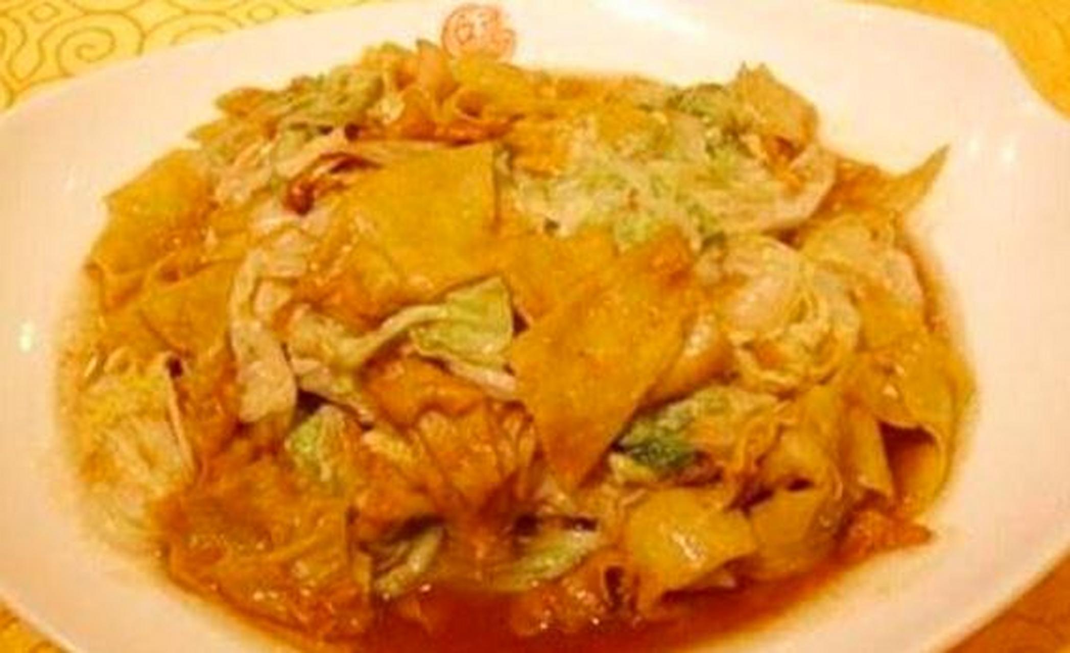 饹馇 饹馇又称咯扎,搁着,隔着,一种河北唐山的面食小吃,用豆面做成饼