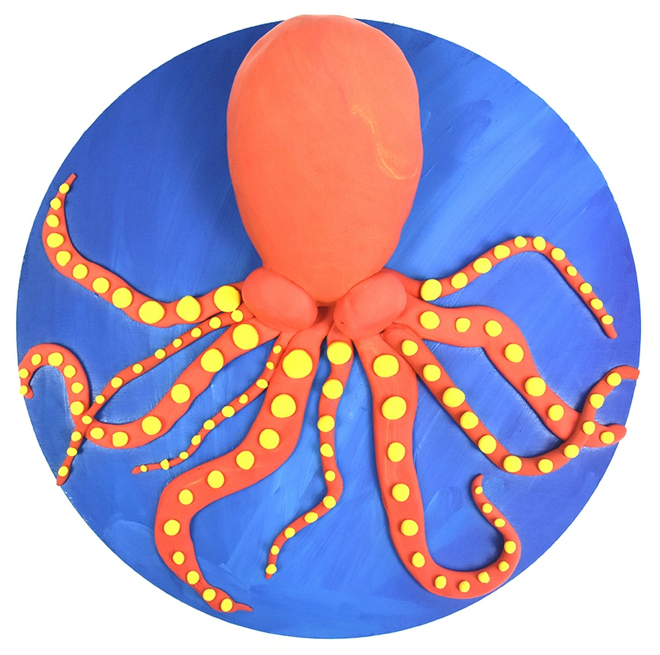 运用轻粘土制作成一只半立体的章鱼 在创作中,我们可以运用轻粘土揉