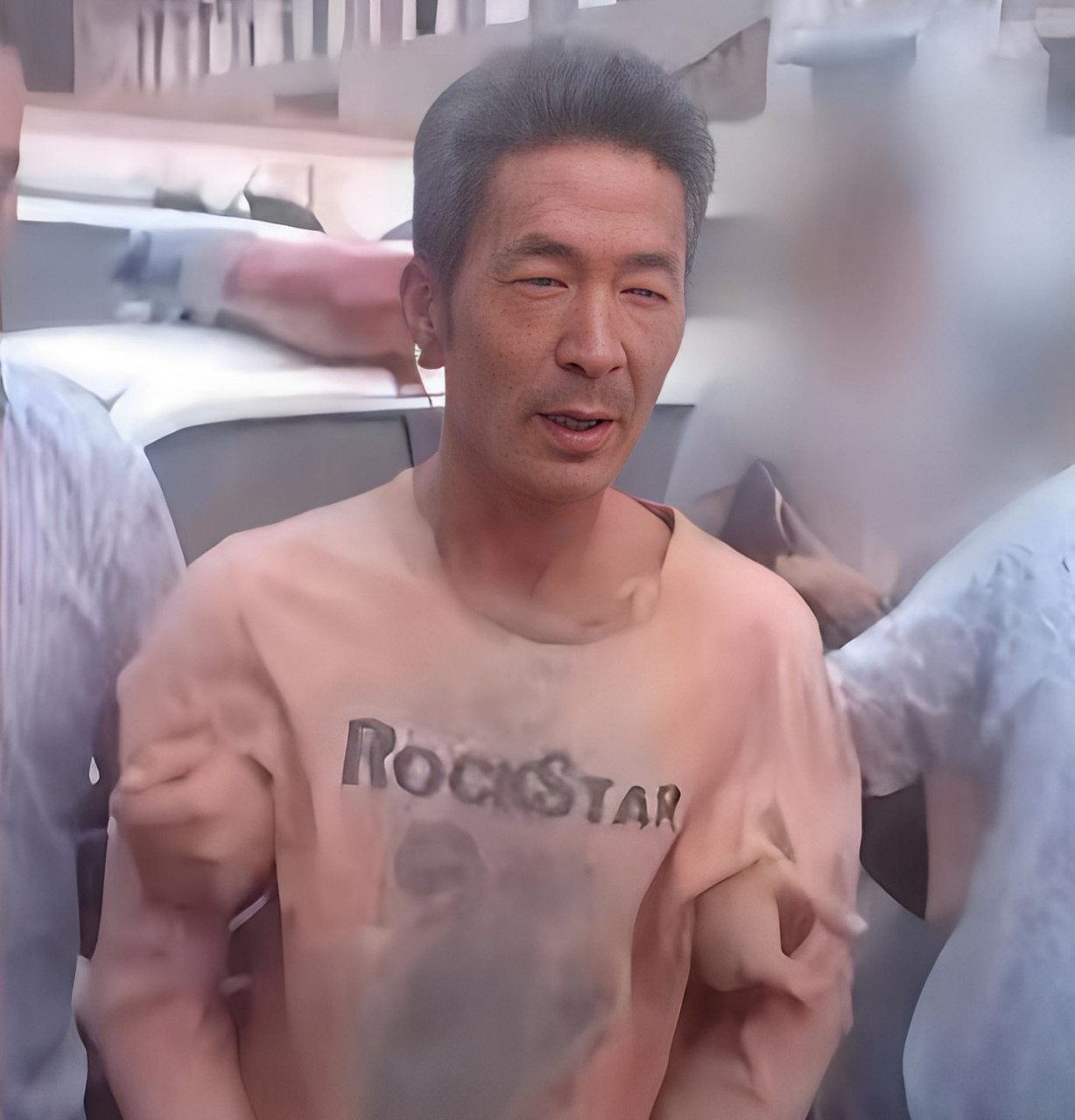 2003年党成喜在拉斯运城山被警察逮捕的照片.
