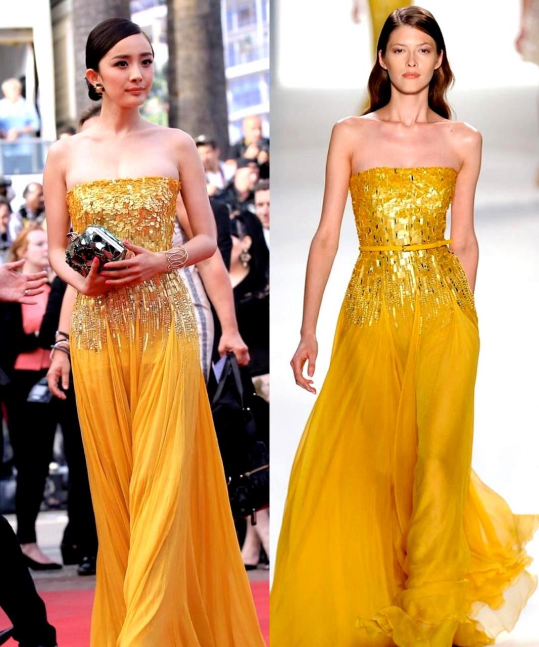 杨幂在戛纳红毯上穿着高定礼服,展现出强大的女王气场,即使与超模相比